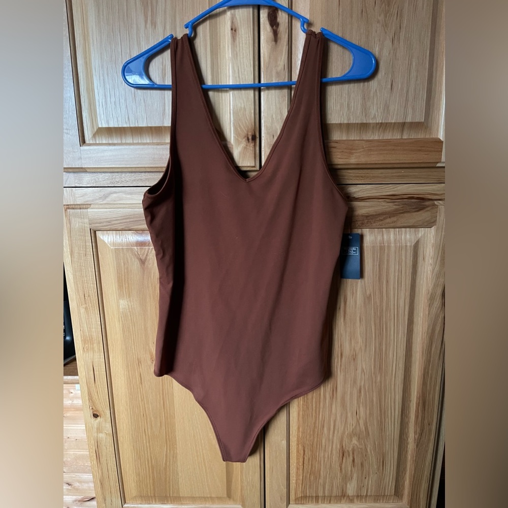 Brown never work body suit